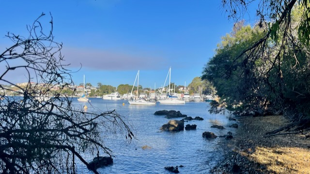 Riverside views showing the yachts and a slight pall of smoke from a fire north of Perth