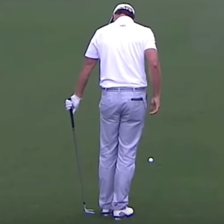 Adam Scott setting his grip